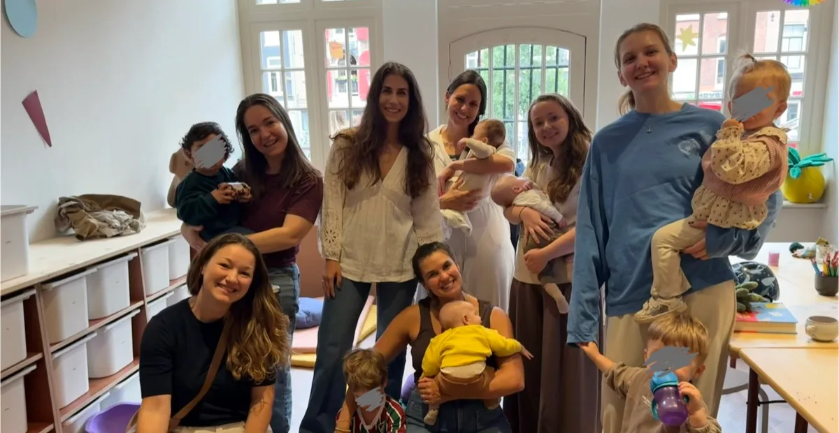 Moms and little ones sharing a relaxed coffee morning together